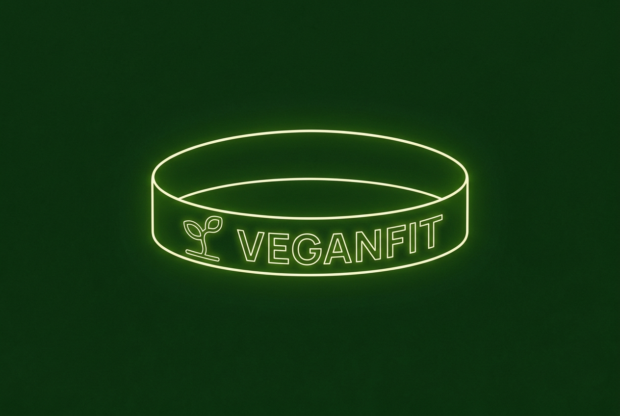One line drawing of a rubber wristband with the VeganFit logo on the band